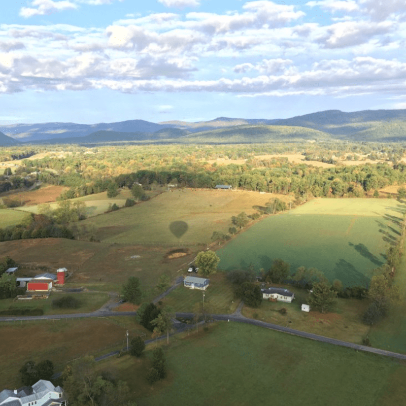 a view of a body of water with a mountain in the background